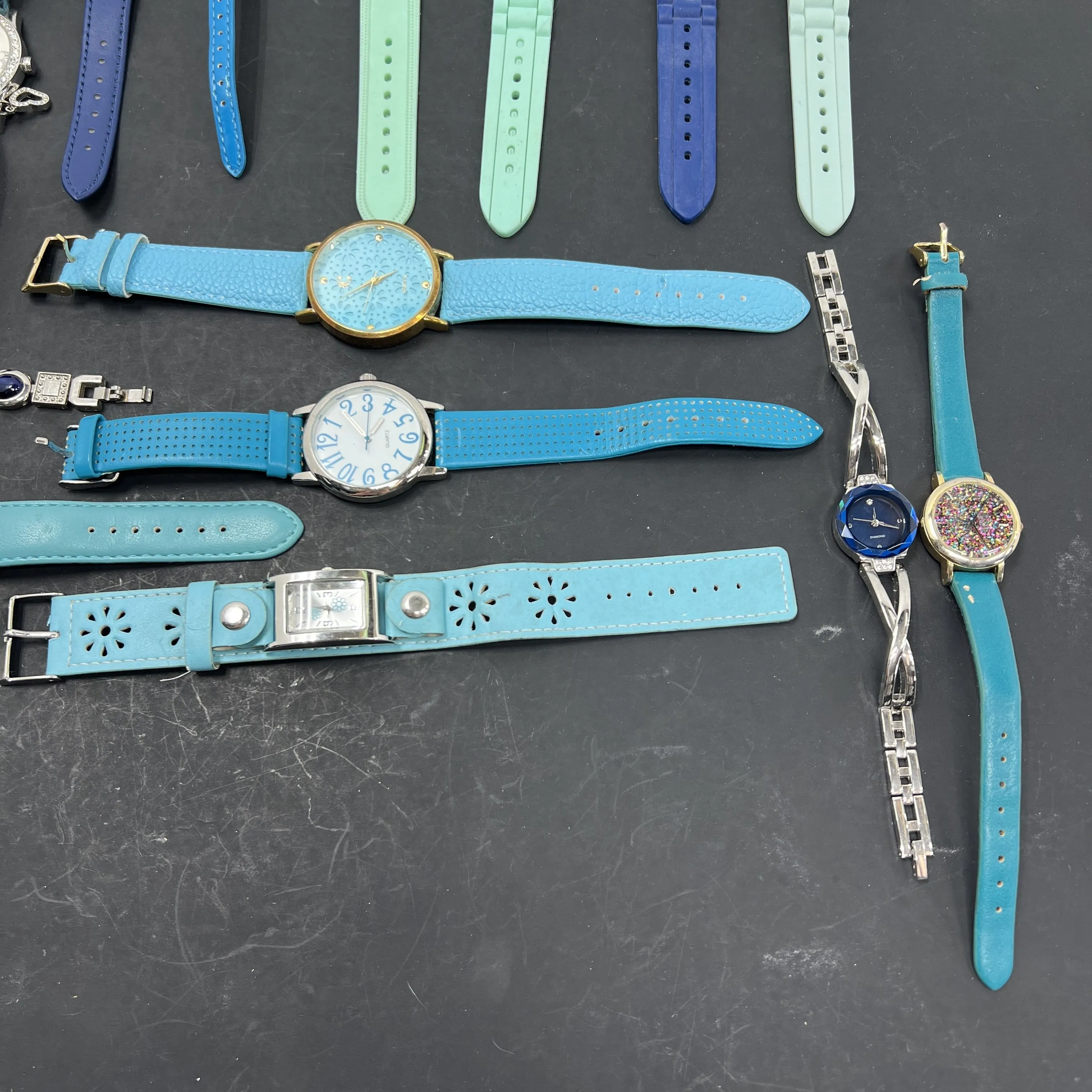 Lot of Twenty Untested Assorted Blue Shades Band Wristwatches *Not Tested*